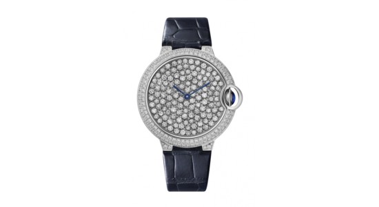 a timeless Cartier watch dotted with diamond accents