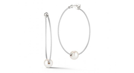 a pair of white gold hoop earrings featuring single pearls