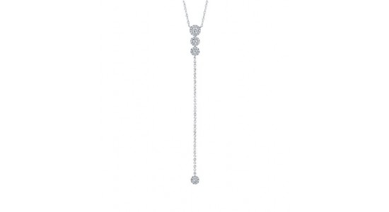 A white gold and diamond lariat necklace from Shy Creation, available at Deutsch & Deutsch.