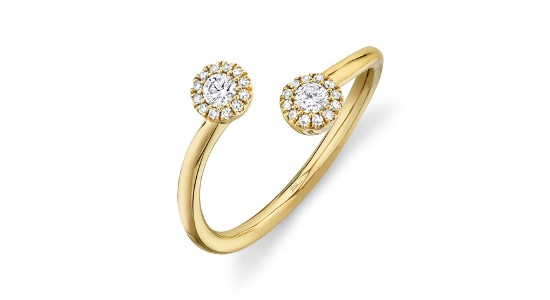 A yellow gold fashion ring with two halo set diamonds, available at Deutsch & Deutsch.